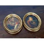 Two oval gilt framed pictures Classical scenes.