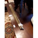 Collection of brass stair rods.