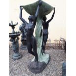 Good quality bronze fountain in the form of a tree trunk flanked by two nudes holding aloft a bowl.