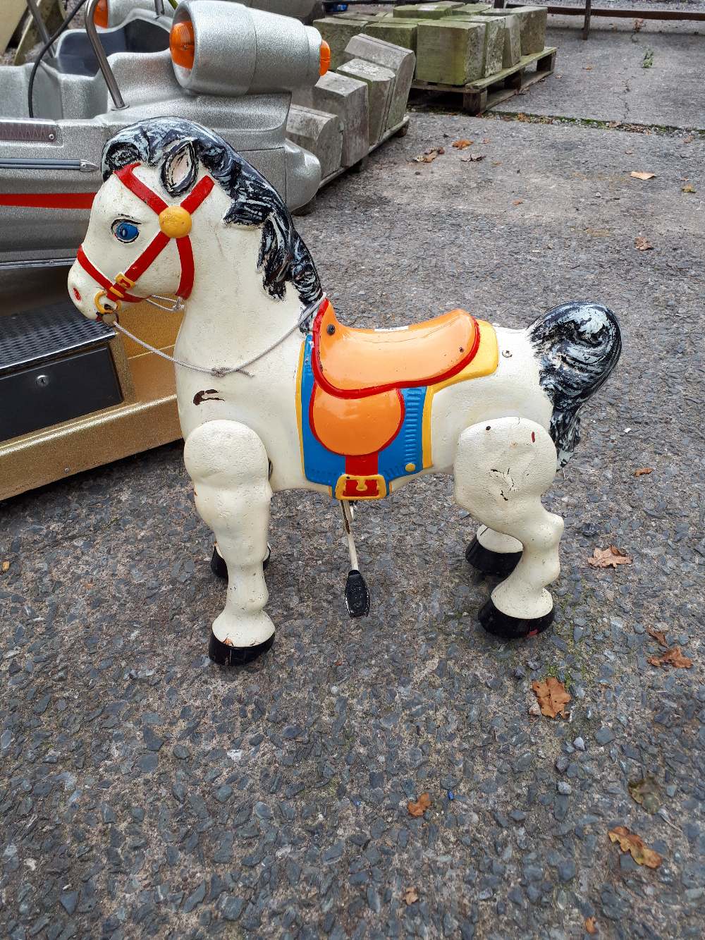 Early 20th C. painted metal rocking horse.