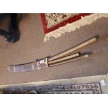 Three 19th. C. Oriental knives in original scabbard.