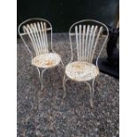 Pair of early 20th C. garden chairs.