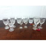 Selection of twelve cut crystal glasses.