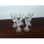 Set of five Waterford crystal sherry glasses.