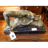 Bronze figure of reclining Lady on marble base.