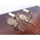 Pair of brass wall sconces.