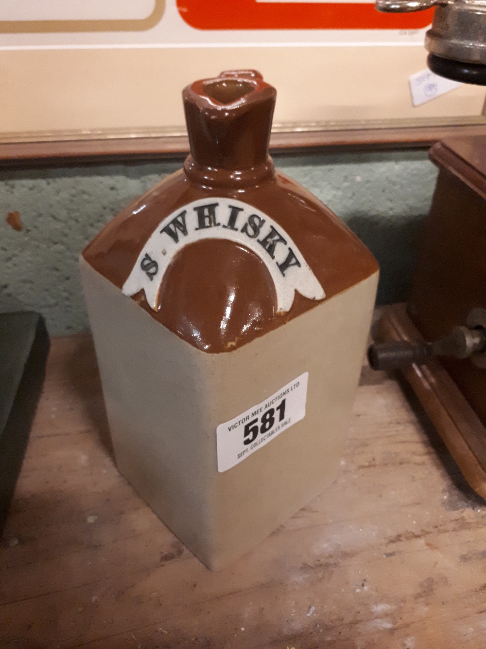 SCOTCH WHISKY stoneware flagon.