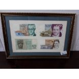 Collection of Series - C Irish bank notes mounted in a frame.