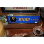 Harp Lager' Advertising Clock (battery), 19.25 x 6 x 2.25ins.