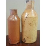 Two Doulton Lambeth Earthenware Poison Bottles with impressed registration and maker marks,