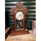Late 19th C. gingerbread mantle clock.