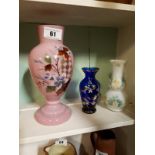 Three painted glass vases.