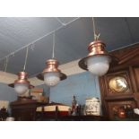 Three early 20th C. copper haging lanterns with white shades.