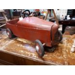 Early 1950s tin plate childs pedal car.
