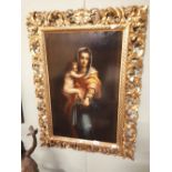 19th. C. Oil on Canvas Madonna and Child mounted in a decorative gilt frame. { 84cm H X 56cm W }.