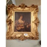 19th. C. Oil on Canvas - The Musician, mounted in a decorative gilt frame in the Rococo style.