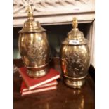 Pair of embossed brass Urn shaped table lamps.