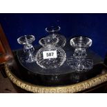 Four cut crystal candle holders.