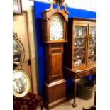 Victorian long case clock with painted arched dial.