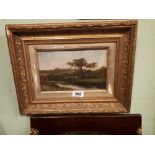 19th C. gilt framed '' Landscape '' oil on board.