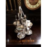 Neat silver plate egg cups and spoons set.