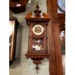 Late 19th.C decorative German wall clock with brass movement.