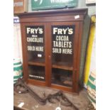 Two door mahogany wall cabinet advertising Fry's chocolate.