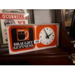 Draught Guinness advertising clock.