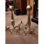 Pair of 19th C. brass and metal fire dogs.