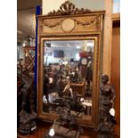 Gilt framed 19th C. Pier mirror in the empire style.