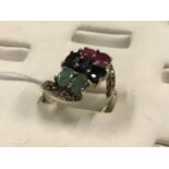 Ladies Silver ring with inset Jade and Ruby cluster.