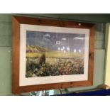 Framed landscape print.