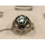 Ladies Silver ring with inset pearl stone.