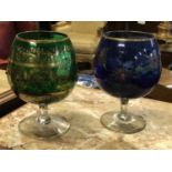 Pair of large decorative brandy glasses.