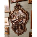 Decorative gilt wall mirror.