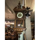 Late 19th.C decorative German wall clock with brass movement.