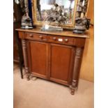 Regency mahogany server with 2 drawers over 2 blank doors flanked by two half spiral columns and