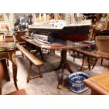 Two pillar inlaid mahogany table with extra leaf in the Regency style. (329 cm W x 160 cm W).