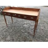 Georgian mahogany server with gallery back 3 drawers on four turned legs.