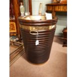 Large Irish mahogany peat bucket with brass straps and brass liner.