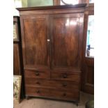 Georgian mahogany two door linen cupboard 2 doors over two short drawers over two long graduated