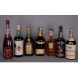 Lotto di sette bottiglie di cui una di Cognac CAMUS grand V.S.O.P., una di MARTELL V.S.O.P., una