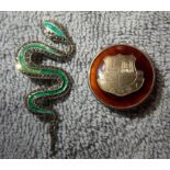 STERLING SILVER ENAMEL AND MARCASITE COBRA LAPEL BROOCH AND A STERLING SILVER MOUNTED TENBY COAT OF