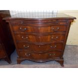 GEORGE III STYLE MAHOGANY SERPENTINE CHEST FITTED WITH A BRUSHING SLIDE OVER FOUR DRAWERS ON SPLAY