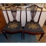 PAIR OF GEORGE III HEPPLEWHITE DESIGN CAMEL BACK DINING CHAIRS W ITH PIERCED WHEATSHEAF SPLATS,