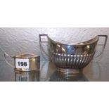 SILVER OVAL MUSTARD POT WITH BLUE GLASS LINER AND A SILVER GADROONED TWIN HANDLED SUCRIER