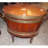 GEORGE III MAHOGANY OVAL AND BRASS BANDED WINE COOLER WITH CARRYING HANDLES,