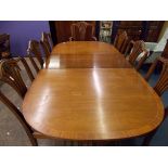 GEORGE III STYLE MAHOGANY CROSSBANDED TWIN PEDESTAL EXTENDING DINING TABLE WITH SEVEN HEPPLEWHITE