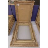 PAIR OF GILT WOOD CARVED PICTURE FRAMES (INTERNALLY 30CM X 47CM) GLAZED AND ANOTHER GLAZED GILT