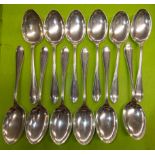 SET OF TWELVE DESSERT SPOONS 23.